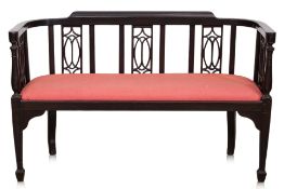 AN UPHOLSTERED WOOD BENCH