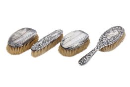 A GROUP OF ENGLISH SILVER DRESSING TABLE BRUSHES