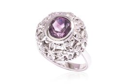 AN AMETHYST AND DIAMOND COCKTAIL RING