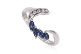 A SAPPHIRE AND DIAMOND RING