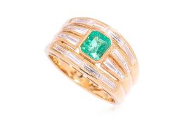 AN EMERALD AND DIAMOND RING