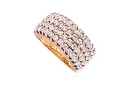 A FOUR ROW DIAMOND RING