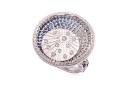 A SAPPHIRE AND DIAMOND 'ORBIT' RING