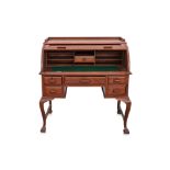 A TEAK CYLINDER BUREAU AND CHAIR