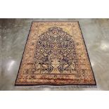 A LARGE MACHINE MADE WOOL RUG (280 x 190cm)