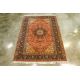 A LARGE MEDALLION WOOL RUG (290 x 190cm) - Image 1 of 3