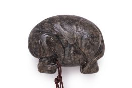 A CARVED JADE MODEL OF AN ELEPHANT