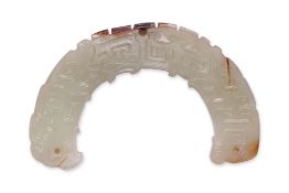 AN ARCHAISTIC JADE HUANG PENDANT