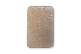 A CELADON JADE PLAQUE