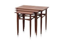 A MID-CENTURY SET OF THREE NESTING TABLES