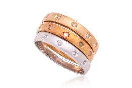 A SET OF THREE STACKING DIAMOND RINGS
