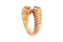 AN AMETHYST AND CITRINE BYPASS RING BY BULGARI