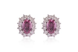 A PAIR OF PINK SAPPHIRE AND DIAMOND 'HALO' SCREW-ON EARRINGS