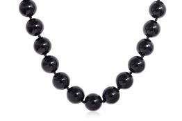 TIFFANY & CO - AN ONYX BEAD NECKLACE