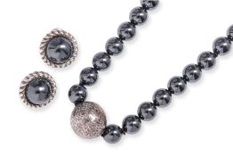 TIFFANY & CO - A HEMATITE BEADED NECKLACE AND ROPE TWIST EARRINGS