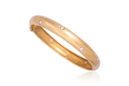 A DIAMOND SET HINGED BANGLE
