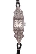 A BULOVA ART DECO STYLE GOLD AND DIAMOND COCKTAIL WATCH