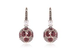 A PAIR OF RUBY, DIAMOND AND BLACK DIAMOND EARRINGS