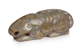 A LARGE CELADON AND RUSSET JADE MODEL OF A TIGER