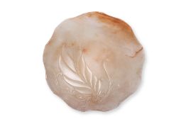 A FOLIATE CARVED JADE SHALLOW DISH