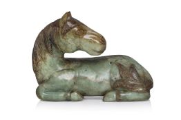 A VERY LARGE GREEN JADE MODEL OF A HORSE