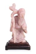 A LARGE ROSE QUARTZ FIGURE OF SHOU LAO