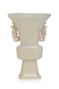 A WHITE JADE TWIN HANDLED GU VASE