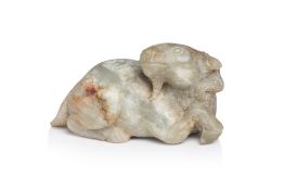 A JADE CARVING OF A RAM