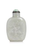 A TWO TONE CELADON AND BROWN JADE SNUFF BOTTLE