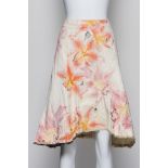 ROBERTO CAVALLI - A FLORAL LEATHER SKIRT WITH A LEOPARD PRINT TRIM