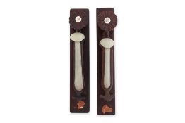 TWO JADE HAIRPINS ON STANDS