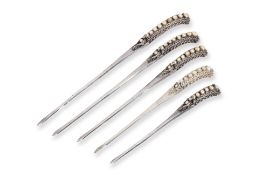 A SET OF FIVE SILVER AND PEARL HAIRPINS