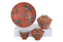 A GROUP OF FOUR FAMILLE ROSE CORAL GROUND PORCELAIN WARES