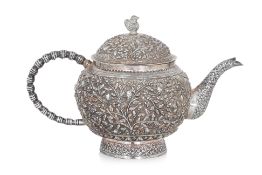 A SILVER TEAPOT AND COVER