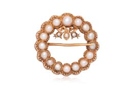 A SILVER-GILT PEARL KEROSANG BROOCH