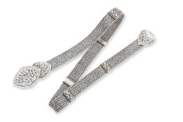 A SILVER BELT AND TRI-FORM BUCKLE