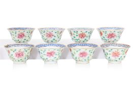 A SET OF EIGHT FAMILLE ROSE PEONY DECORATED BOWLS