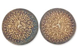 A PAIR OF SILVER-GILT BOLSTER ENDS
