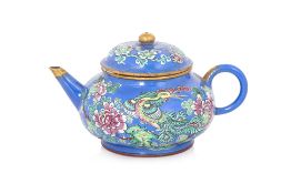 AN ENAMELLED YIXING TEAPOT AND COVER