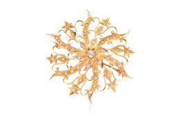 A GOLD AND DIAMOND BROOCH