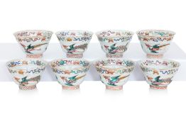 A SET OF EIGHT FAMILLE ROSE PHOENIX AND PEONY TEA BOWLS