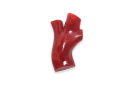 A RED CORAL 'BRANCH' BROOCH