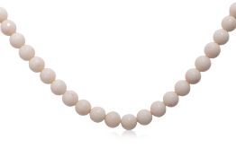 A WHITE CORAL BEAD NECKLACE