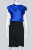 GIORGIO ARMANI - A BLACK ASYMMETRICAL SKIRT AND BLUE TOP