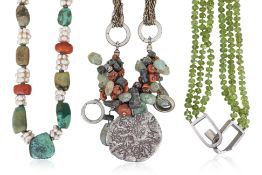 A GROUP OF THREE WHITE METAL AND STONE NECKLACES