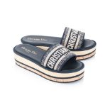 CHRISTIAN DIOR - A PAIR OF DWAY SLIDE IN DEEP BLUE EMBROIDERED COTTON