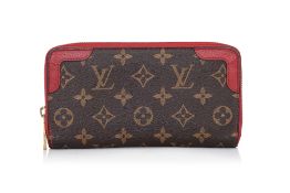 LOUIS VUITTON - A MONOGRAM LEATHER WALLET