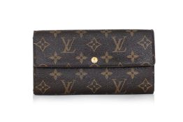 LOUIS VUITTON - A MONOGRAM 'SARAH' WALLET