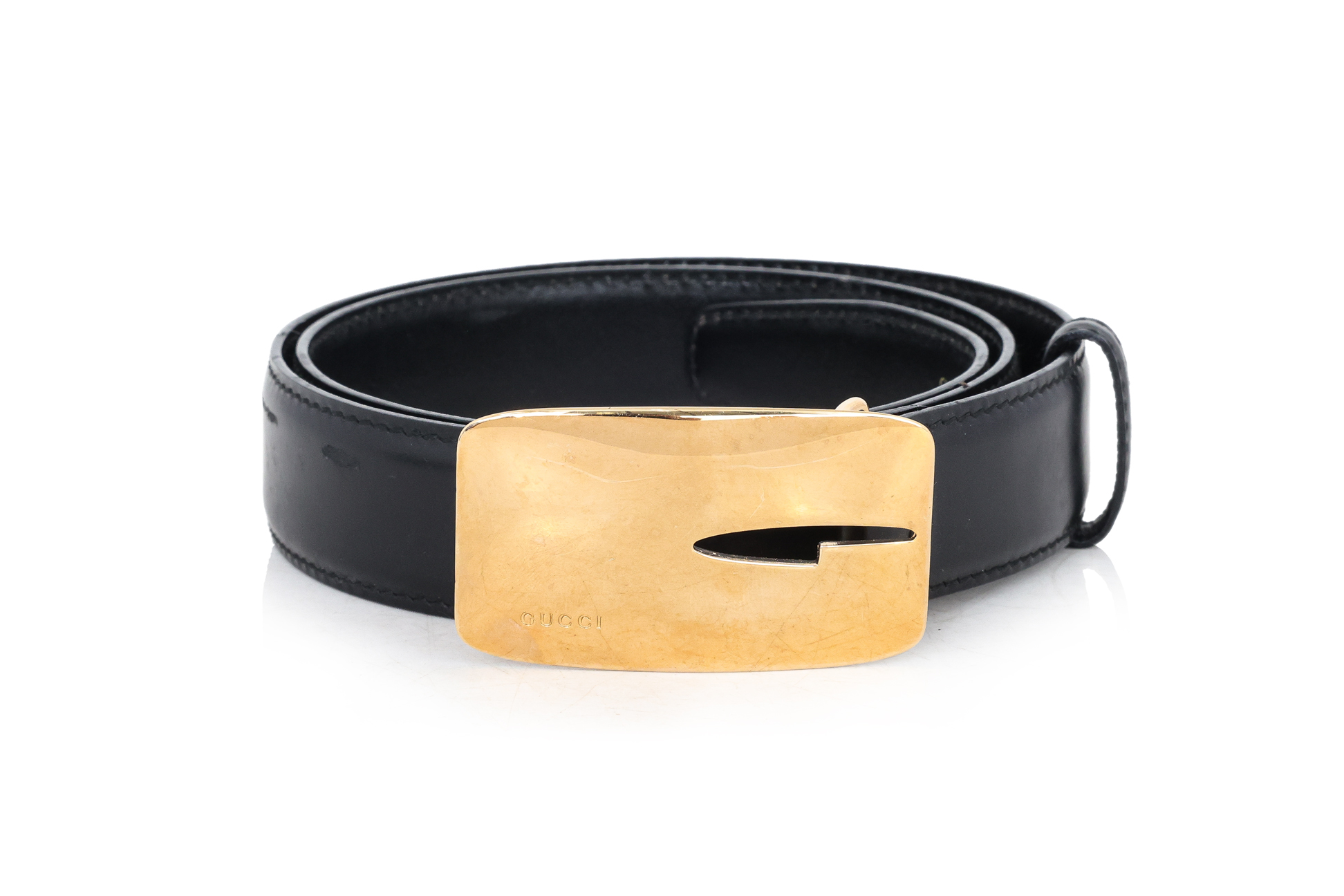 GUCCI - A GOLD TONE 'G' LOGO BELT