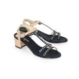 CHANEL - A PAIR OF FAUX PEARL-EMBELLISHED SANDALS